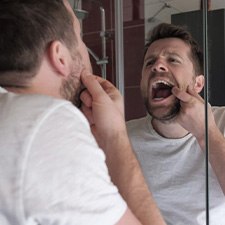 Patient checking for oral cancer at home