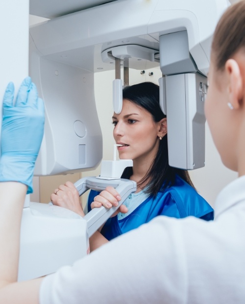 Woman receiving 3 D C T cone beam image scans