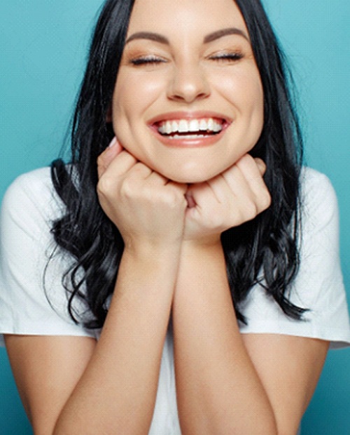 woman smiling with dental bridge in Billerica