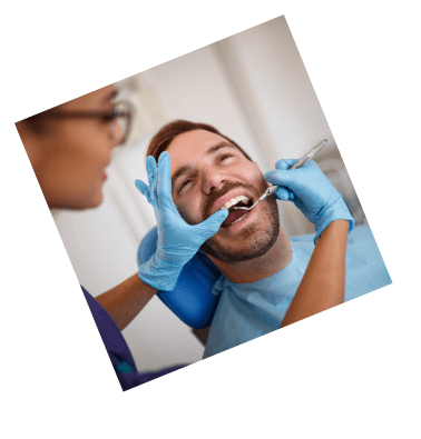 Dentist treating dental patient