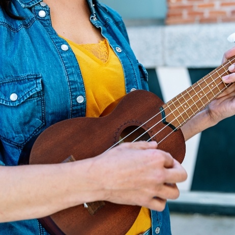 Person playing a ukelele